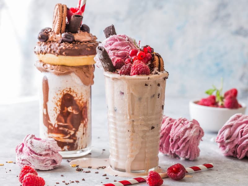 Chocolate Indulgent Frosting Exreme Milkshake With Donut And Sweets